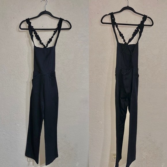Reformation | Black Ruffle Criss Cross Back Jumpsuit Size: XS - Picture 2 of 6